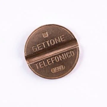 Old telephone token Stock Photos