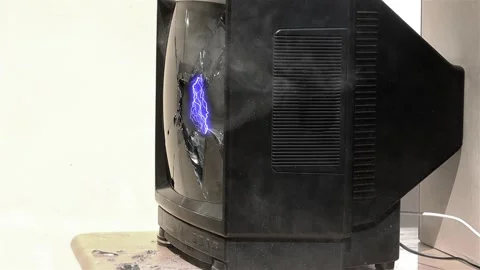 Old television with flash in the hole of the damaged screen Stock Footage 266197089