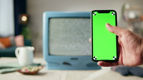 Old television with grey blank screen on home background living room, using Stock-Footage 169117544