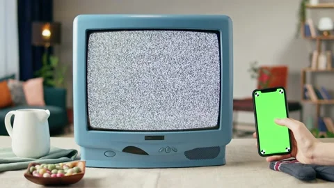 Old television with grey blank screen on home background living room, using Stock Footage 169309735