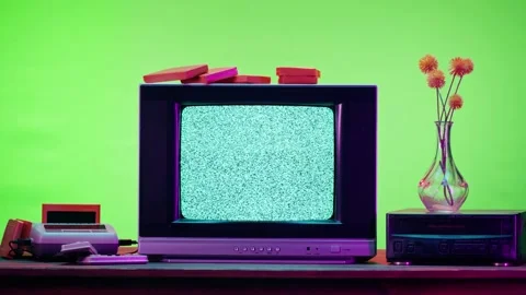 Old television with grey interference screen on purple neon background. Close-up Stock Footage 169195285