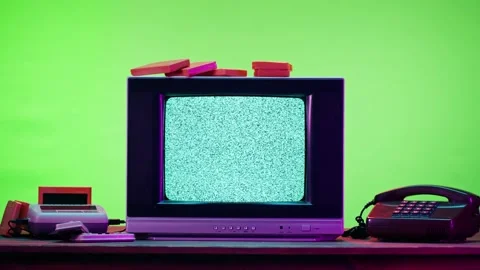 Old television with grey interference screen on purple neon background. Close-up Stock Footage 169195869