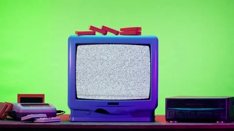 Old television with grey interference screen on purple neon background. Close-up Stock Footage 169196578