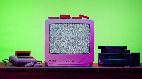 Old television with grey interference screen on purple neon background. Close-up Stock-Footage 169196945
