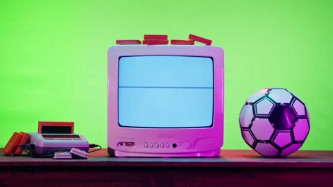 Old television with grey interference screen on green neon background. Close-up Stock Footage 169198094