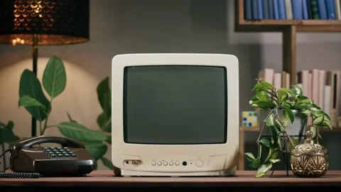 Old television with grey interference screen on home background. Close-up of Vídeo Stock 182006848