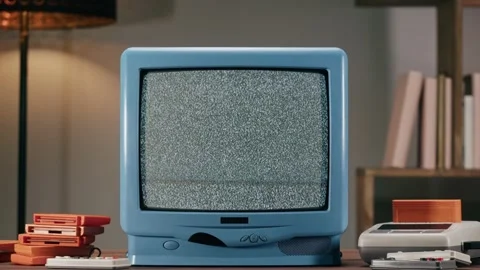Old television with grey interference screen on home background. Close-up of Stock Footage 182007171