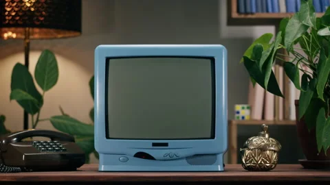 Old television with grey screen on home background. Close-up of vintage tv on Stock Footage 169116477