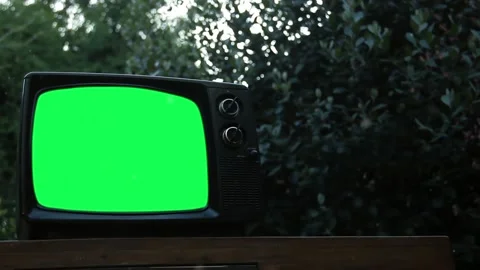 Old Television Set with Green Screen Outdoors. Zoom In. Video stock 124354751