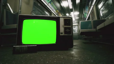 Old Television Set with Green Screen in Subway Car - 4K Stock Footage 198604570