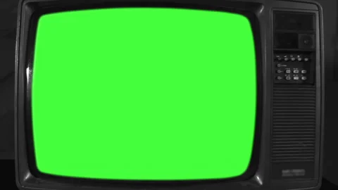 Old Television Set with Green Screen Dynamic Zoom In Close Up - 4K Stock Footage 337329690