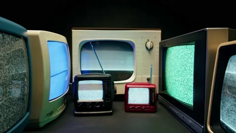 Old televisions with grey interference screen on black background. Vintage tv Stock-Footage 169114292