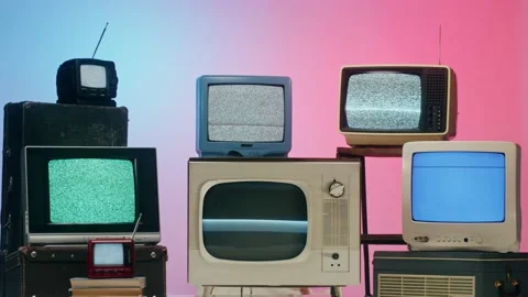 Old televisions with grey interference screen on pink red neon background Stock Footage 169309519