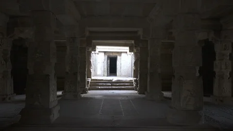 Old Temple pillars  with beautiful engravings, Hampi, Karnataka. Stockbeeldmateriaal 105285638