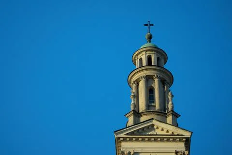 Old temple tower with cross on the top Stock Photos