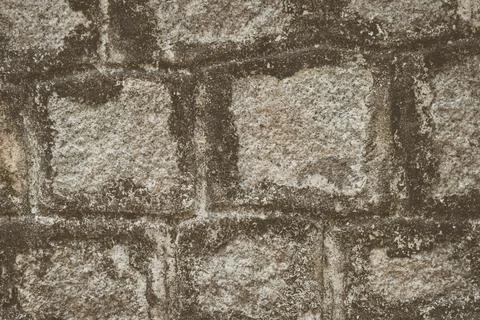 Old Temple wall. Rectangular cut out marble granite brick real surface stone Stock Photos