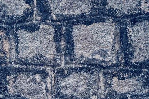 Old Temple wall. Rectangular cut out marble granite brick real surface stone Stock Photos