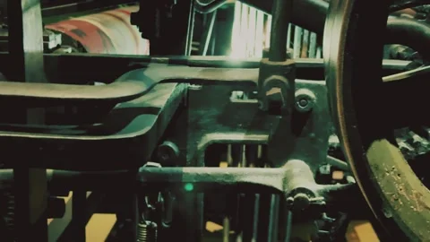Old Textile Machine Details with Metal Mechanism and Industrial Light Stock Footage 336907300