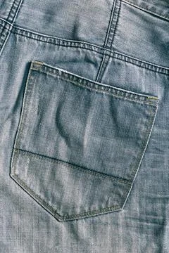 Old texture of Denim background. Vertical image Jeans vintage pattern. Stock Photos
