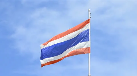 Old thailand flag blowing on flagstaff Stock Footage 26137571
