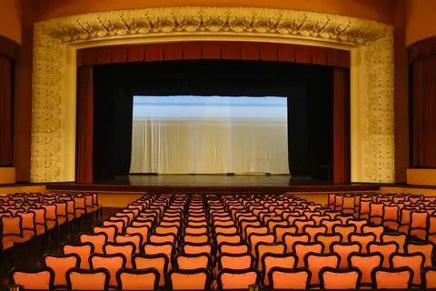 Old Theater, interior view with rows of seats and stage Stock Photos