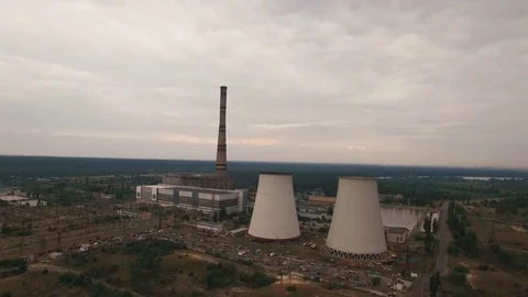 Old thermal power station creating pollution aerial Stock Footage 78769464