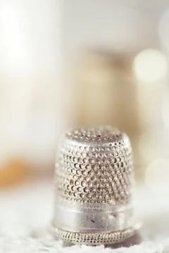 An old thimle and lace backdrop Stock Photos