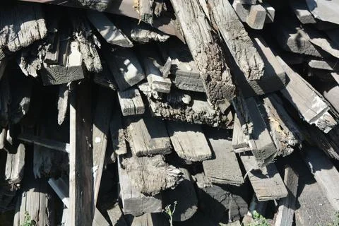 Old things and objects, old grey rotten boards of different sizes. Stock Photos