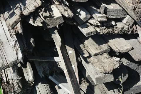 Old things and objects, old grey rotten boards of different sizes. Stock Photos