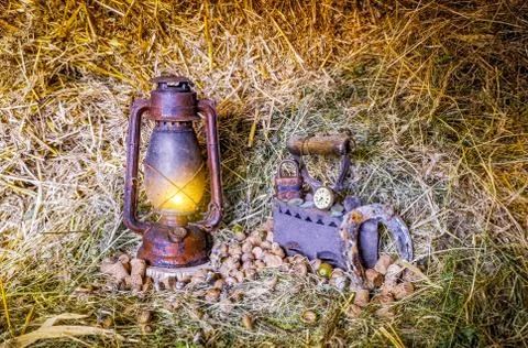 Old things in hay Stock Photos