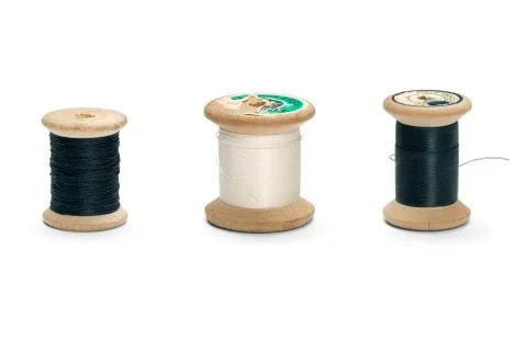 Old thread spools Stockfoto's