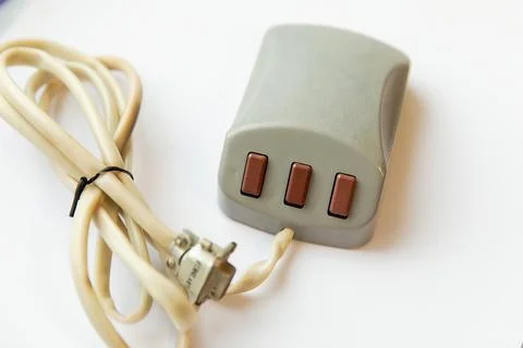 The old three-button mouse manipulator. Stock Photos