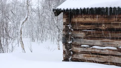 Old timber building in snow fall Stock Footage 238520317