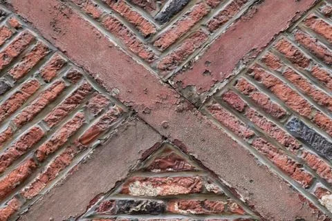 Old timber framed red brick wall ancient building style Stock Photos