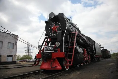 Old time Russian train with a red star Stock Photos