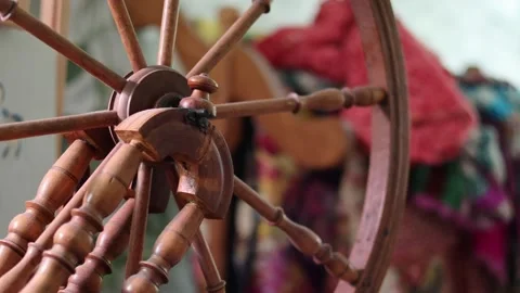 Old time spinning wheel for yarn. Stock Footage 334969773