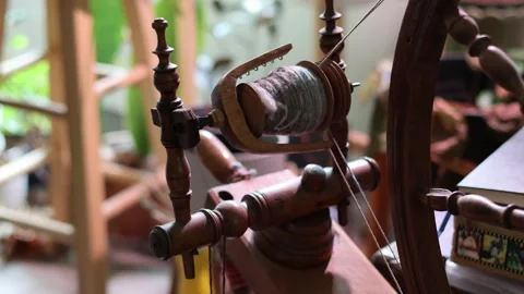 Old time spinning wheel for yarn. Stock Footage 334969781