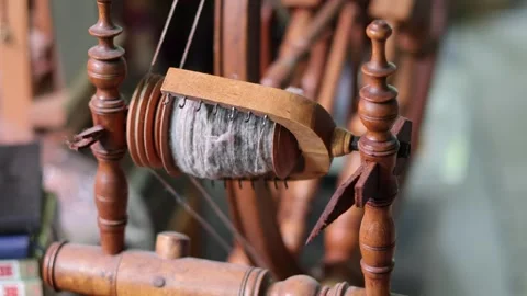 Old time spinning wheel for yarn. Stock Footage 334969790