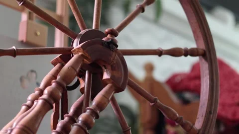 Old time spinning wheel for yarn. Stock Footage 334969805