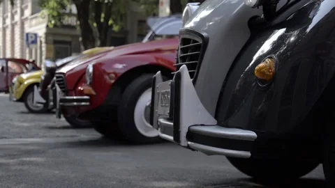 Old timer citroen 2cv parking Stock Footage 84298032