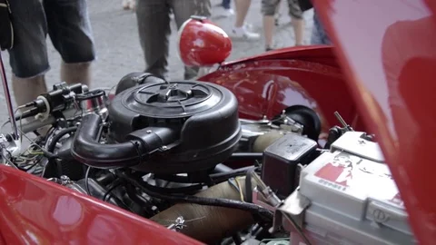 Old timer citroen 2cv red engine bay details Stock Footage 84298106