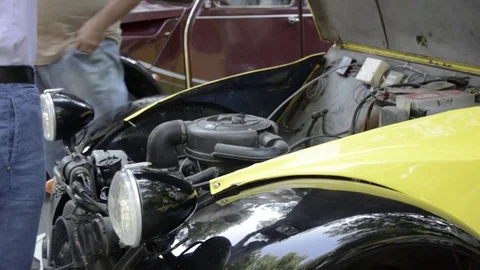 Old timer citroen 2cv yellow engine bay Stock Footage 84298410