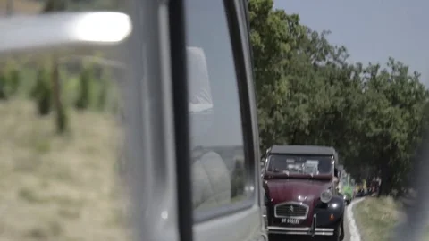 Old timer citroen driving mirror view Stock Footage 84298643