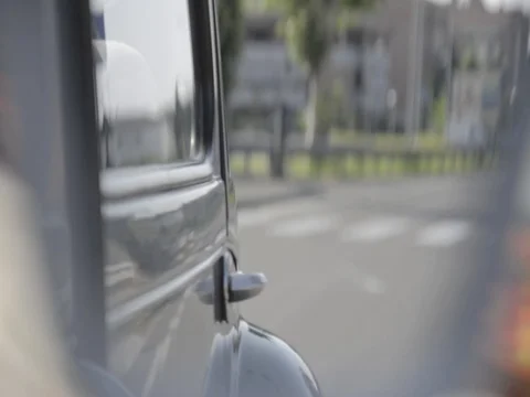 Old timer citroen rear mirror view driving around Stock Footage 84297885