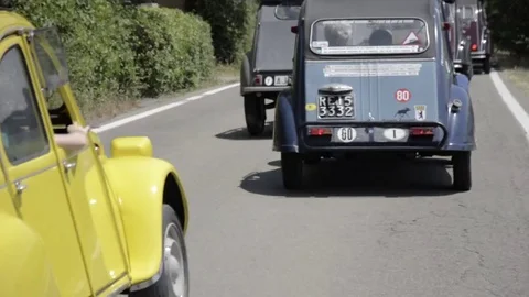Old timer citroen on the road Stock Footage 84298560