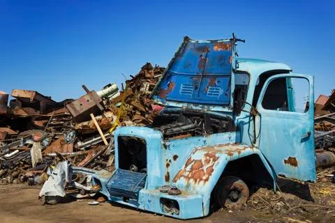 Old timer on junkyard. Stock Photos