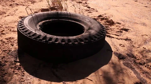 Old tire on beach Stock Footage 39948450