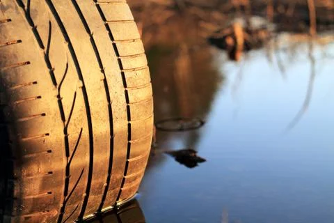 Old tire on the roadside Stock Photos