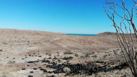 Old Tires in a Ditch Vídeos de archivo 166663684