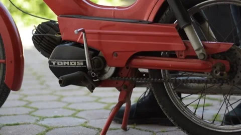 Old Tomos moped startup Stock Footage 154247999